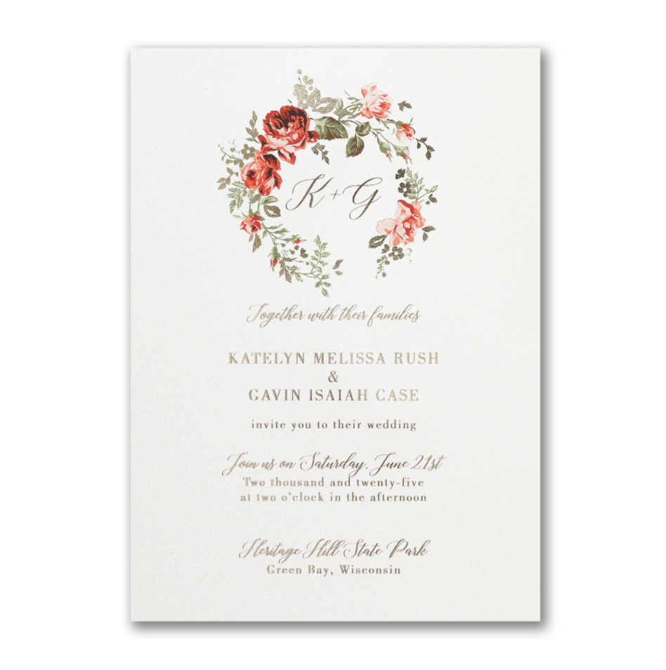 A delicate arch of flowers graces the top of this invitation